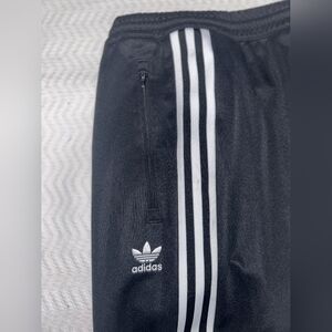 Adidas Men's Essentials 3-Stripes Jogger Pants, Size XL, black, used.